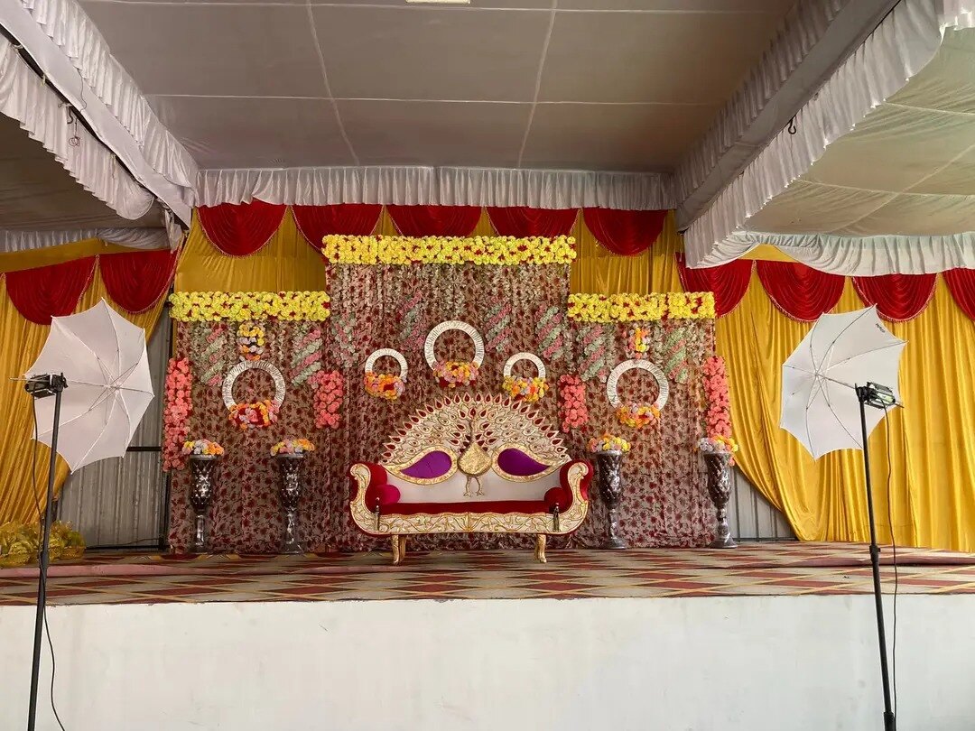 Decorated wedding ceremony stage at Sharda Lawn